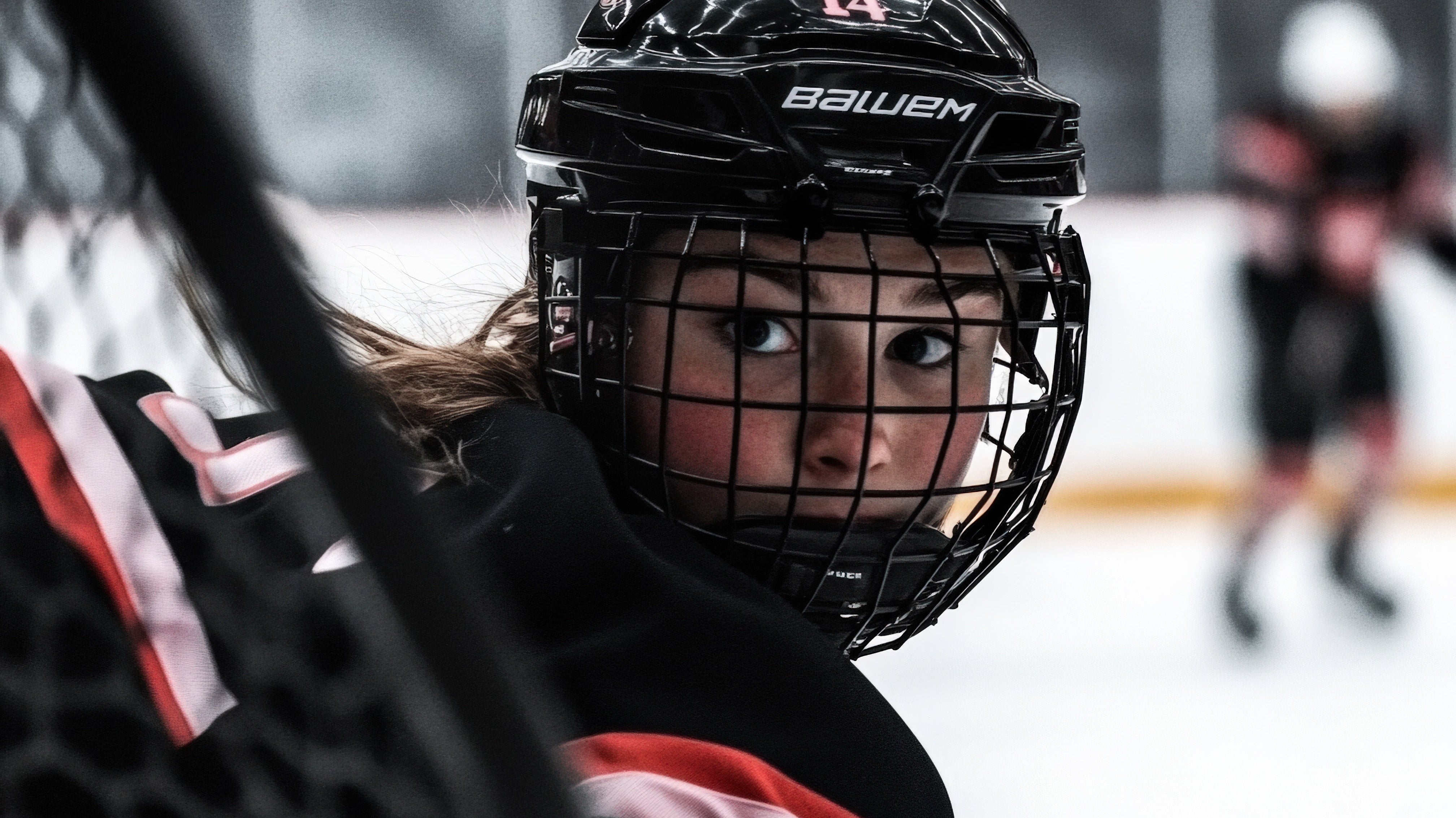 Young girl playing hockey