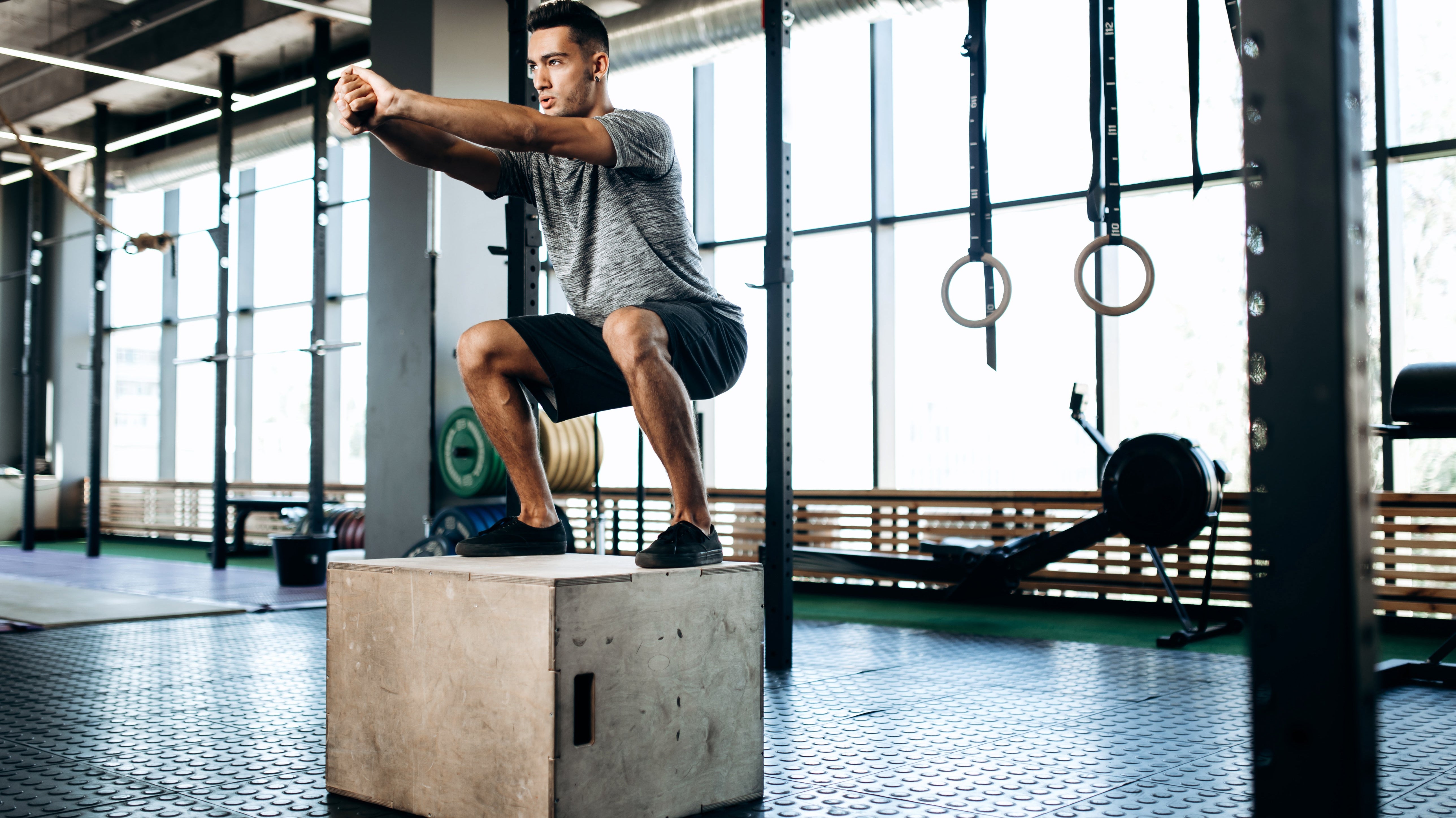 Hockey player doing box jumps