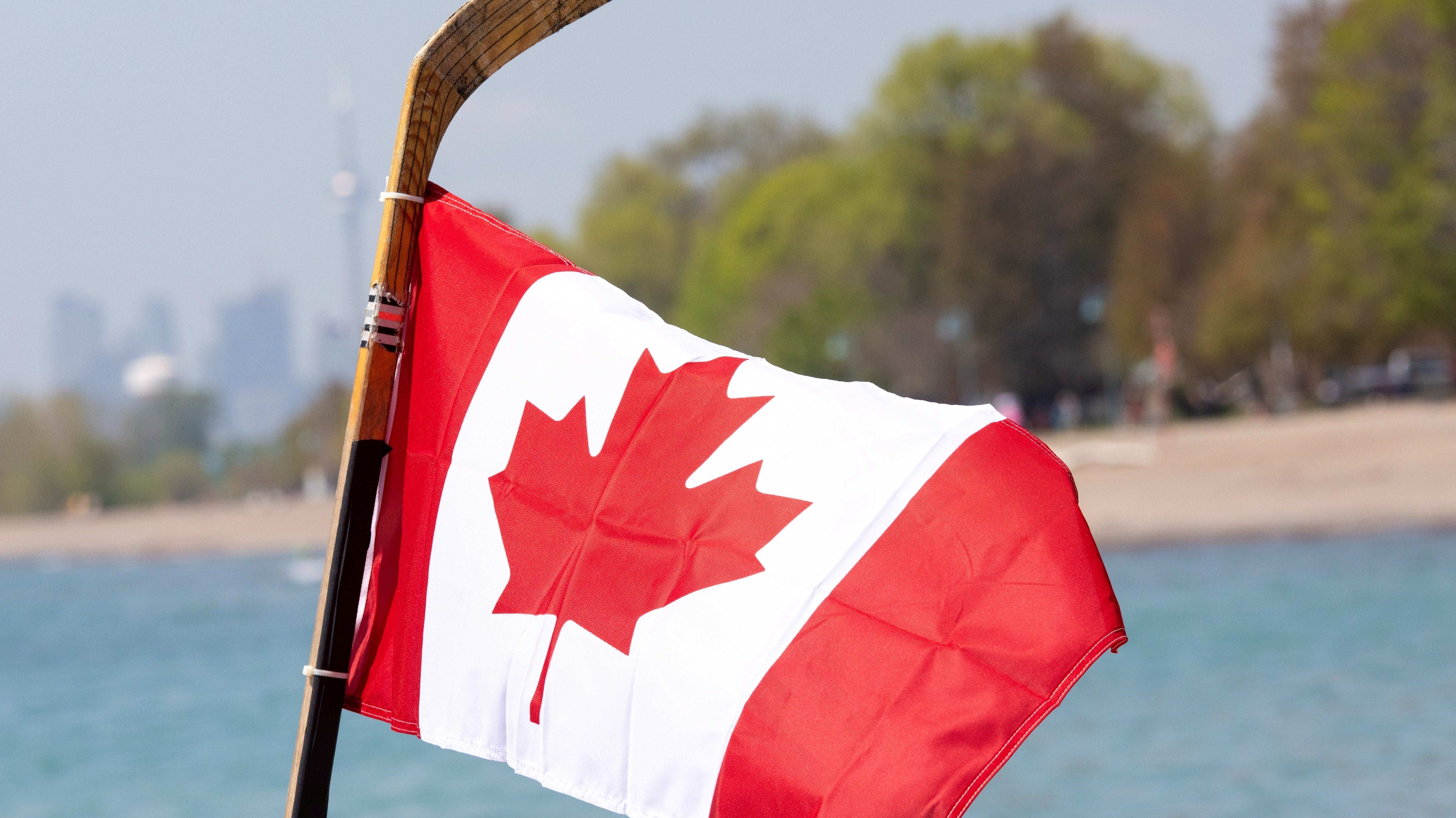 Hockey stick holding Canada flag