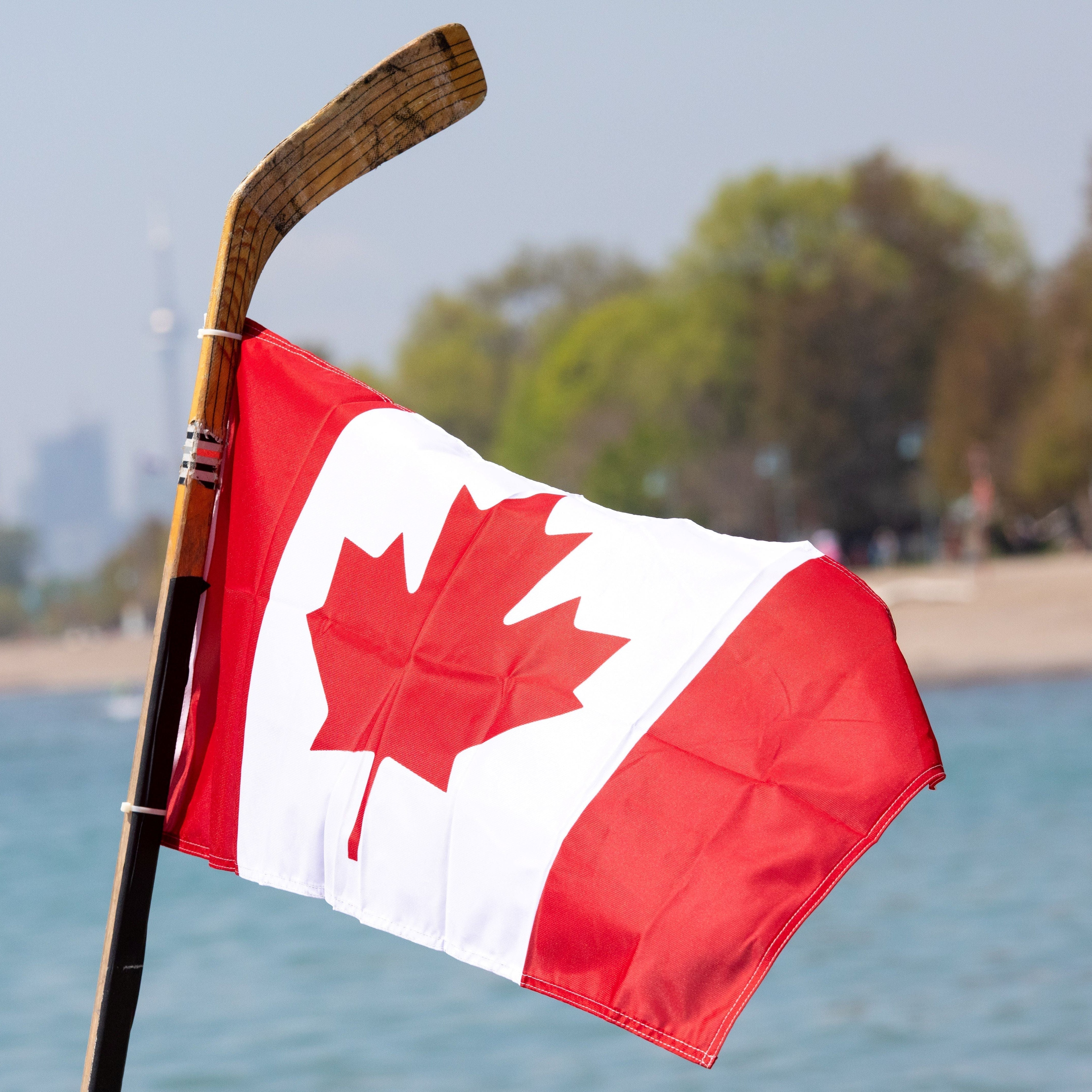 Hockey stick holding Canada flag