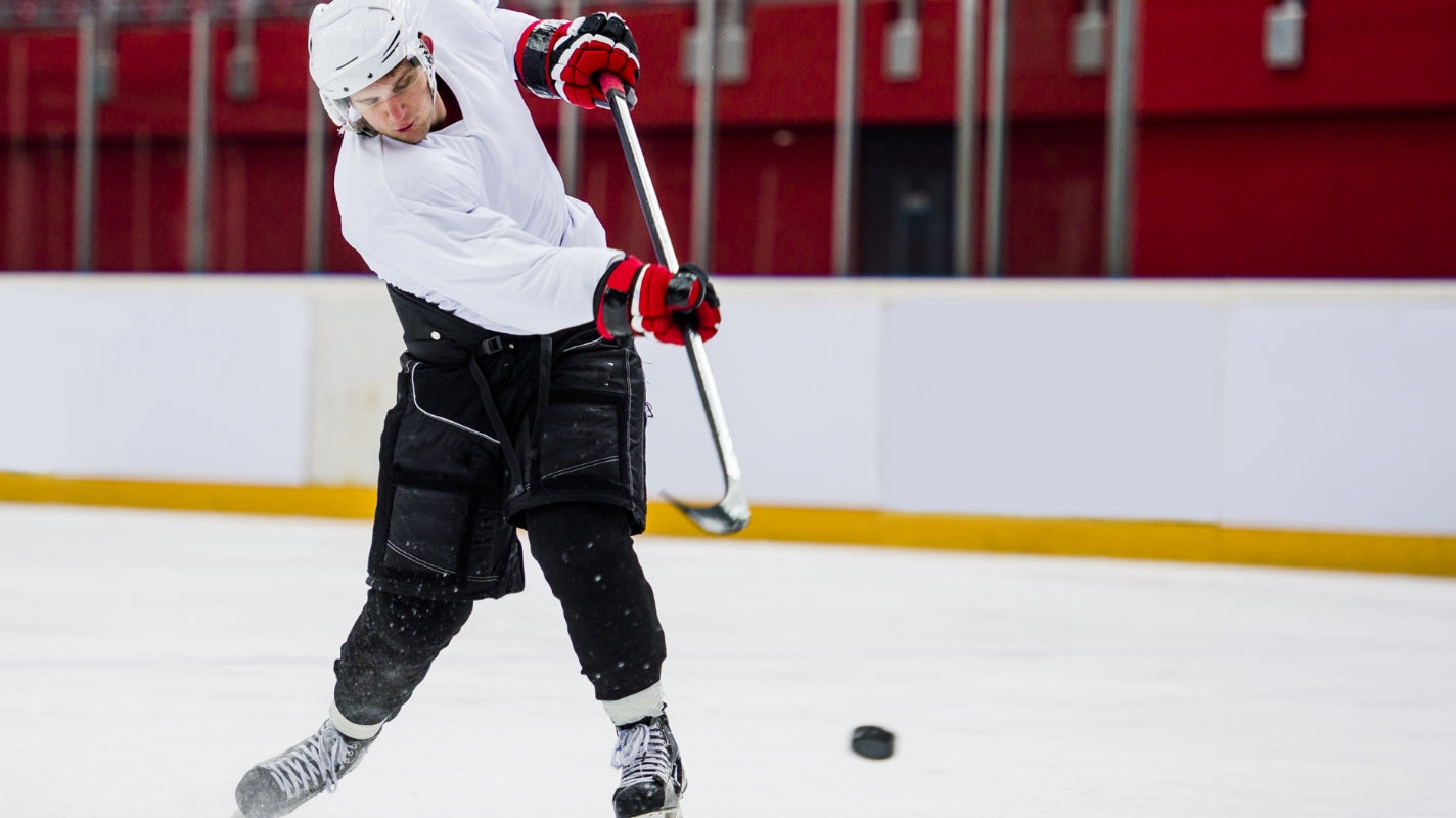 Hockey player perfecting the slapshot