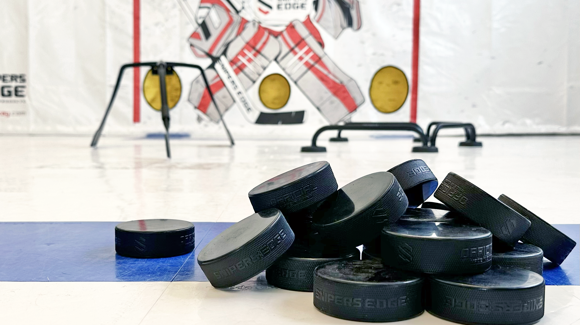 Hockey Pucks and Hockey Drill Equipment