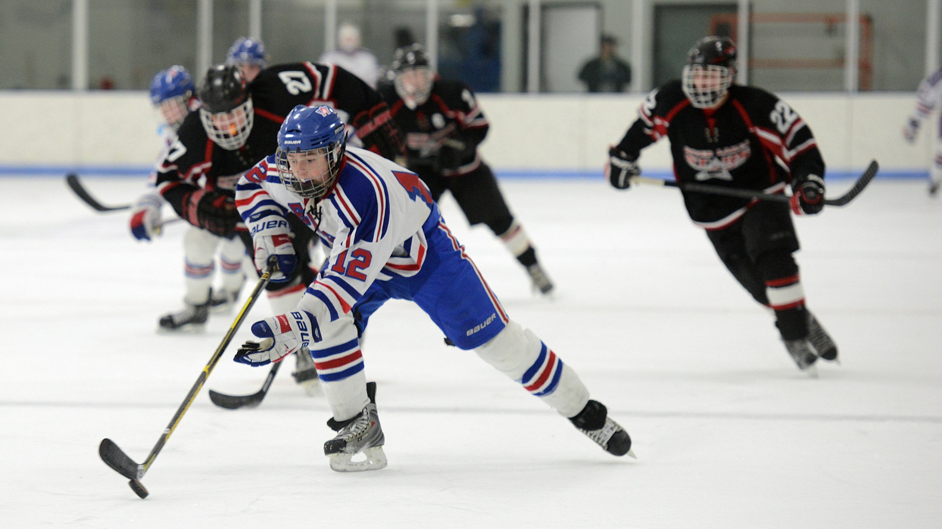 Hockey player scoring a goal