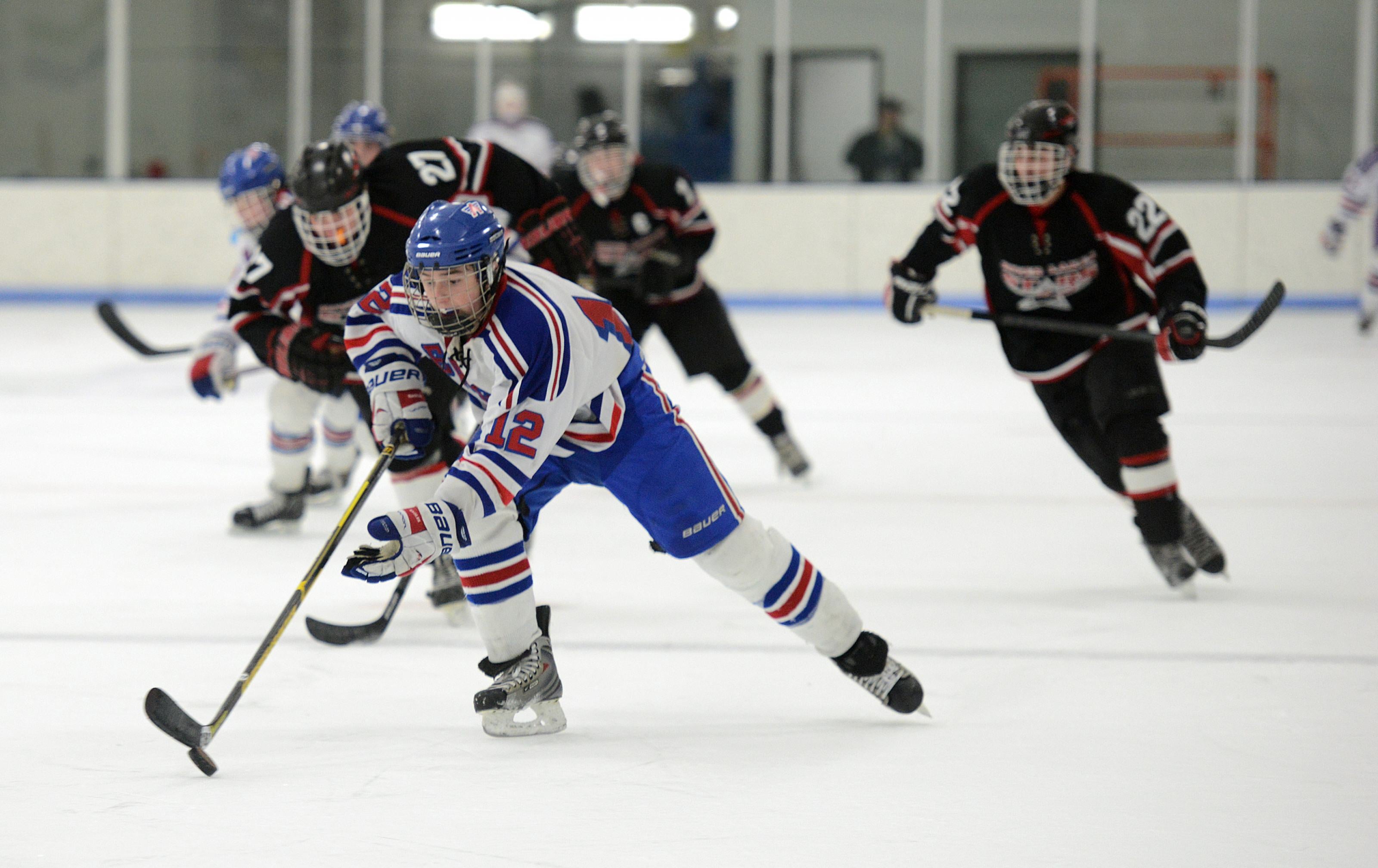 Hockey player scoring a goal