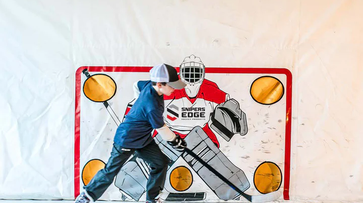 Boy playing ice hockey