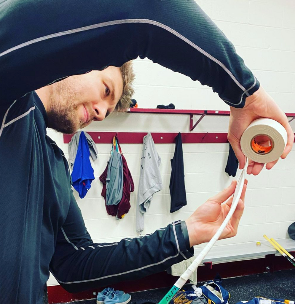 Flyers player James Van Reimsdyk (JVR) taping his stick