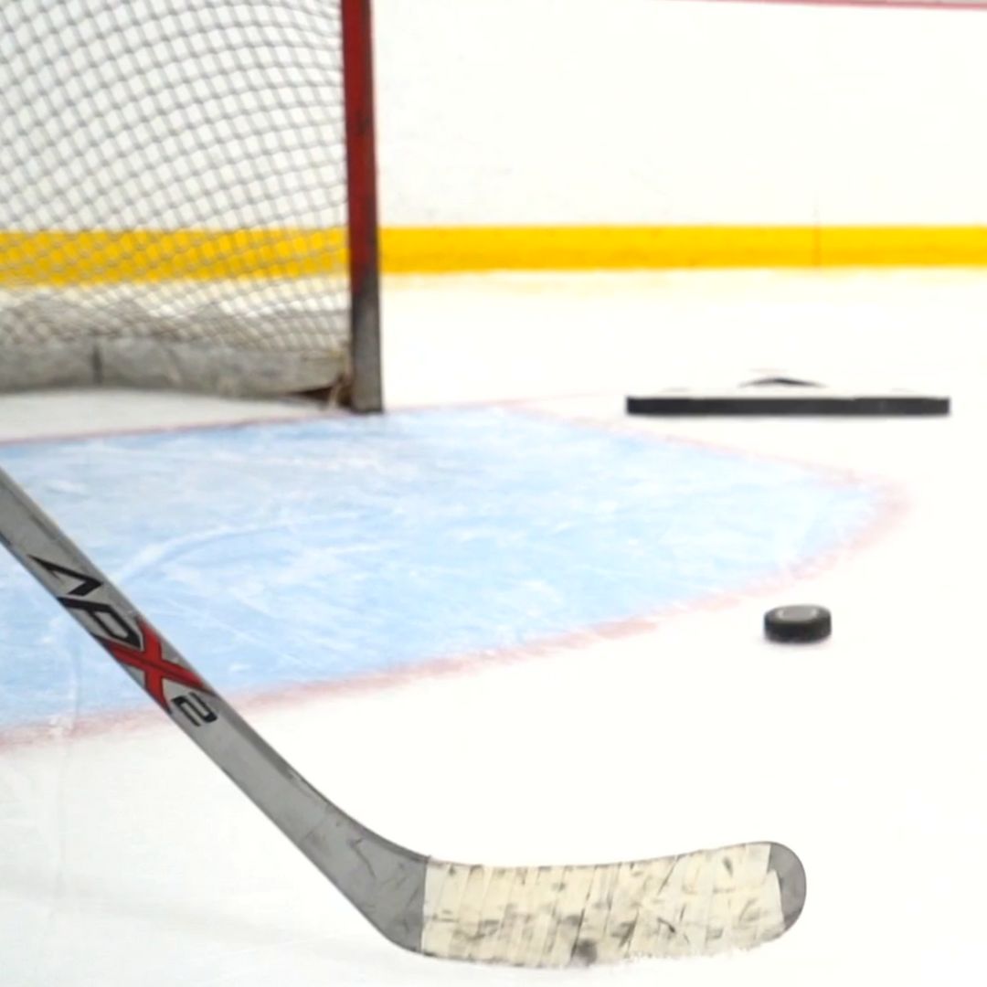 Hockey player using a passmaster on ice
