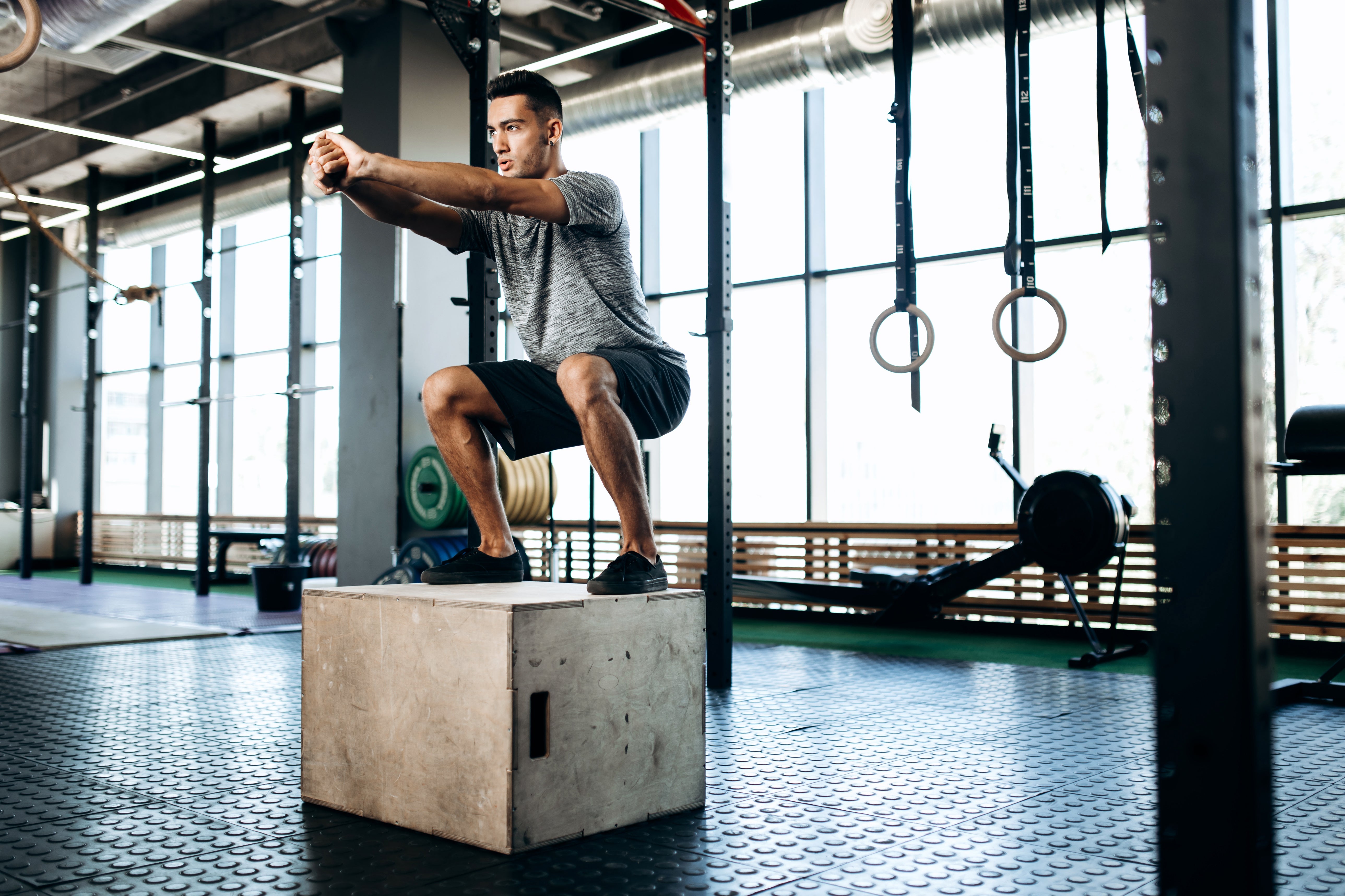 Hockey player doing box jumps