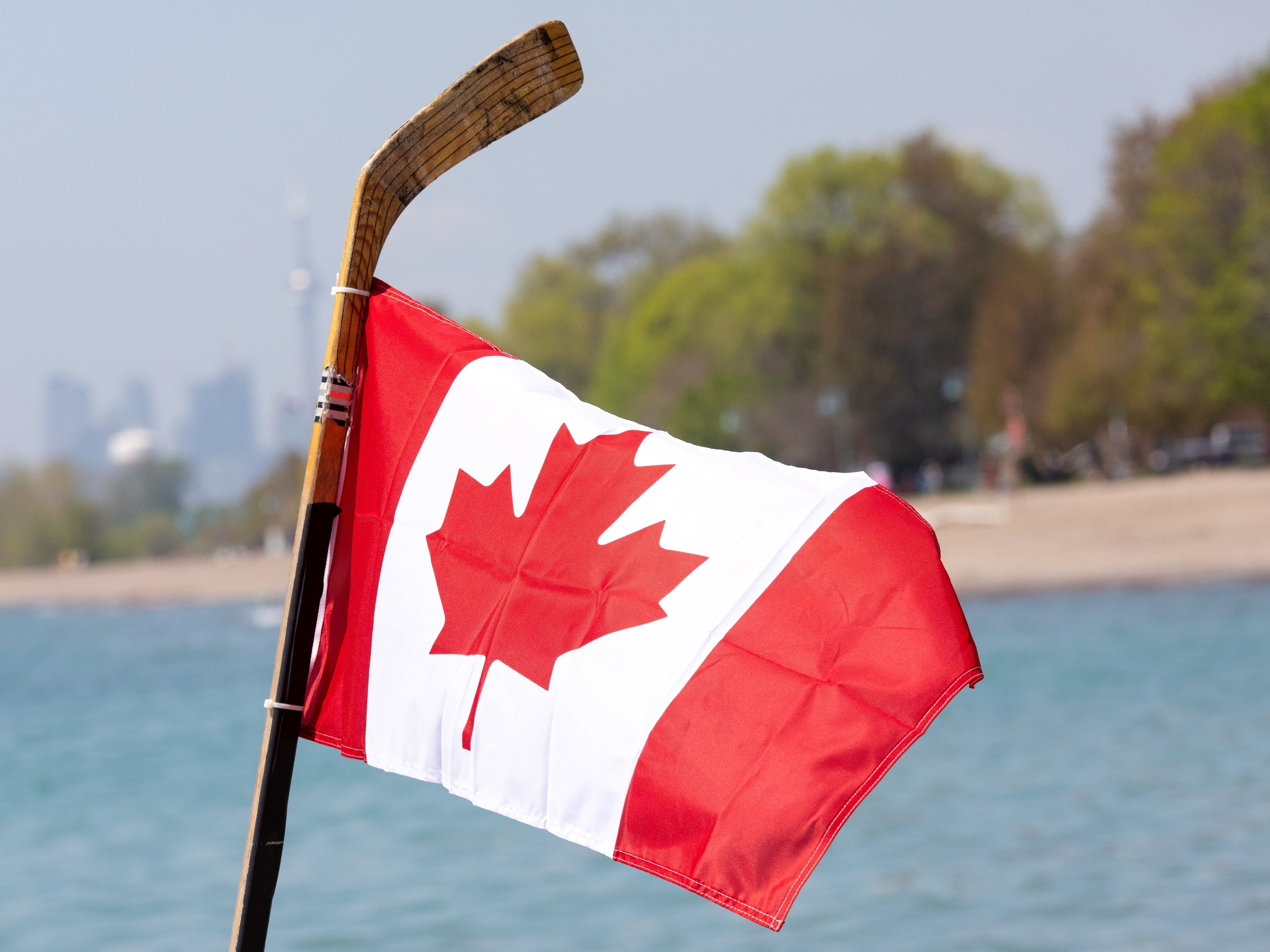 Hockey stick holding Canada flag