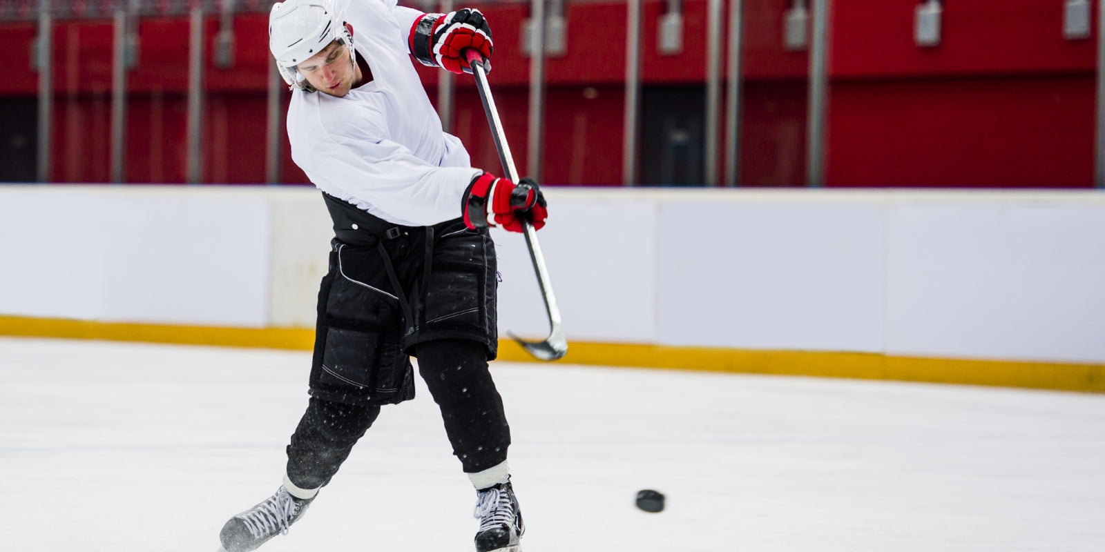 Hockey player perfecting the slapshot