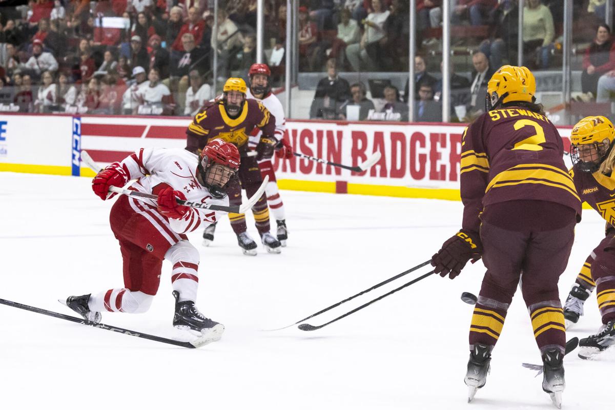 Hockey Players Playing An Intense Game