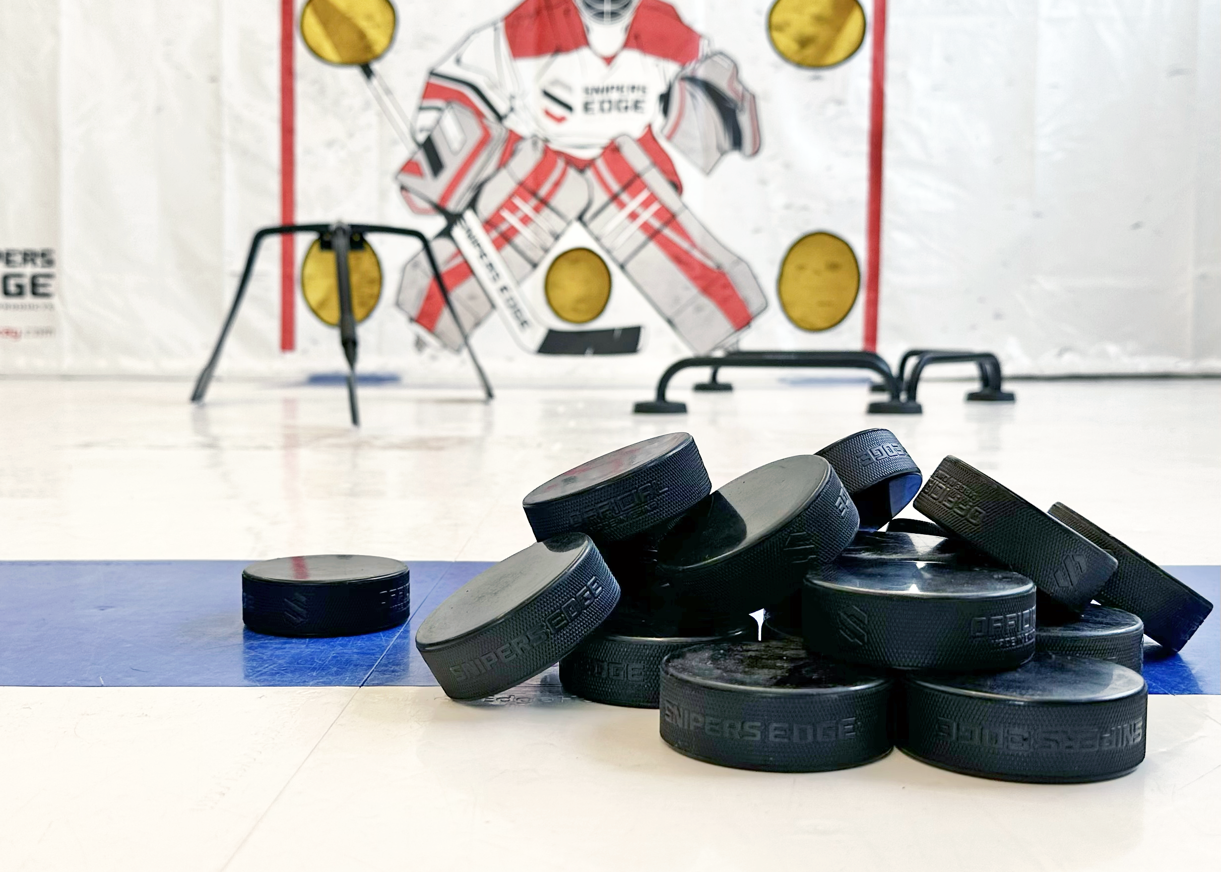 Hockey Pucks and Hockey Drill Equipment