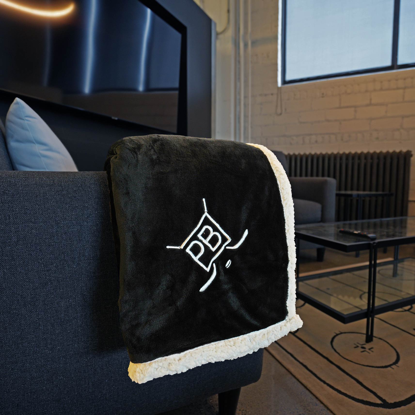 black blanket on couch