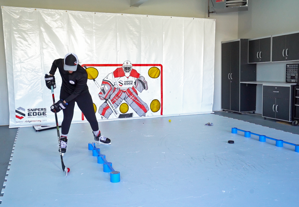 Player stickhandling with SweetHands and skillz ball on synthetic ice