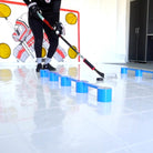 a player stickhandling through a SweetHands on white slick tiles