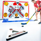 Player passing puck in front of goal on slick white tiles using the passmaster