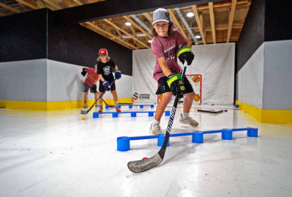 KIDS ENJOYING HOCKEY PRACTICE USING STICKHANDLING BALL - SKILLZ BALL